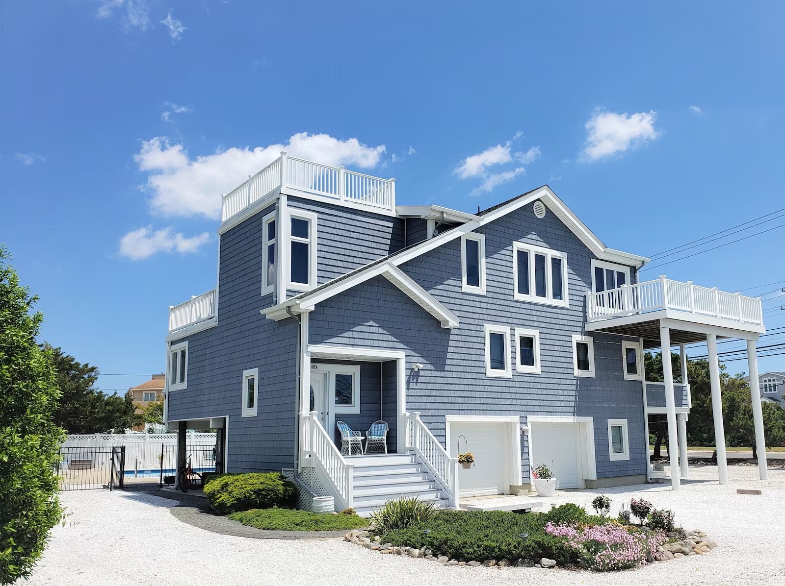 North Beach two-story house with porch and garage